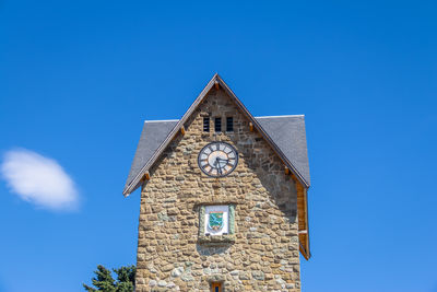 Low angle view of church against clear blue sky
