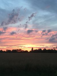 Scenic view of landscape at sunset