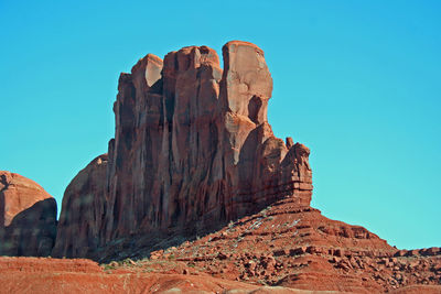 Rock formations against blue sky