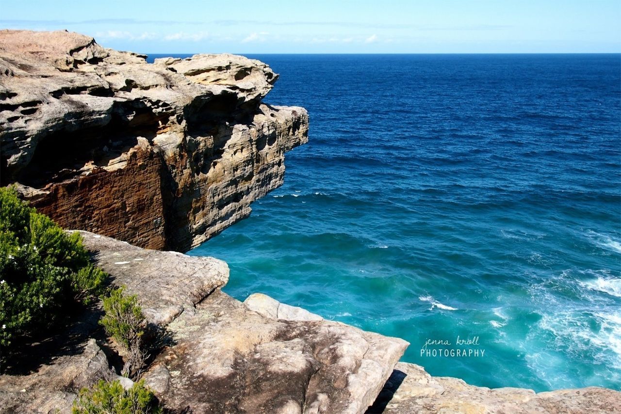 sea, rock formation, water, horizon over water, rock - object, scenics, rock, tranquil scene, tranquility, beauty in nature, cliff, nature, beach, idyllic, rocky, shore, rough, sky, blue, coastline