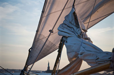 Low angle view of sailboat against sky