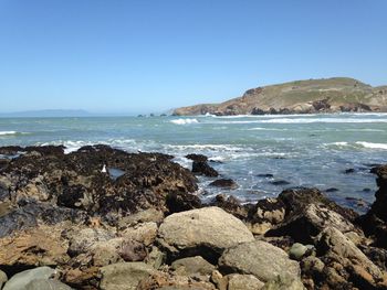 Scenic view of sea against clear sky