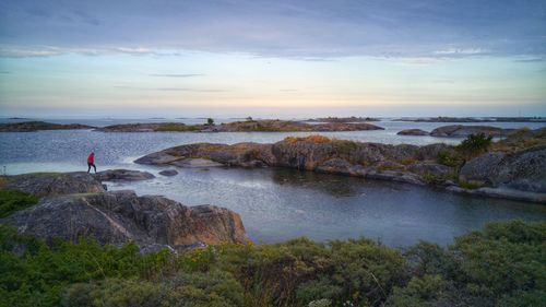 Scenic view of sea against sky at sunset