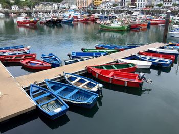 Boats moored at harbor