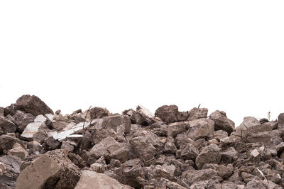 Stack of rocks against clear sky