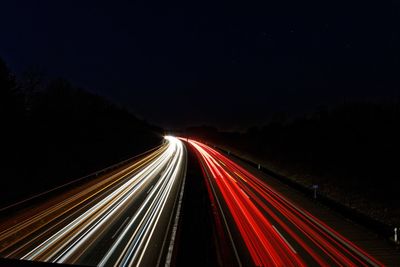 Light trails on road at night