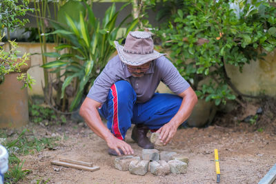 Woman working on plants