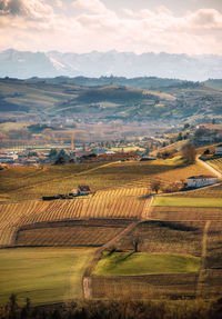 Aerial view of agricultural field against sky