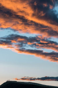 Scenic view of sea against dramatic sky