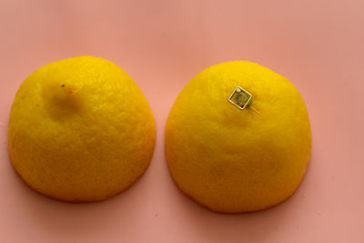 Close-up of orange fruit on table