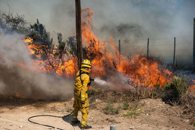 Man relaxing on fire