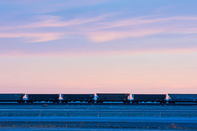 Train against sky during sunset