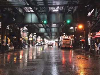 Cars on wet city street