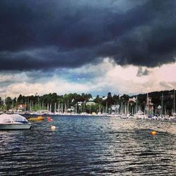 Scenic view of sea against cloudy sky