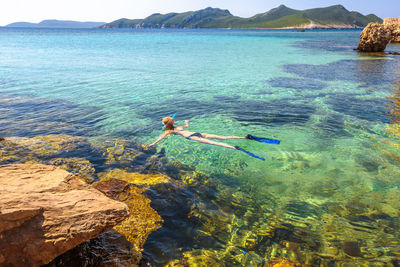 Man swimming in sea