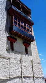 Low angle view of old building against sky