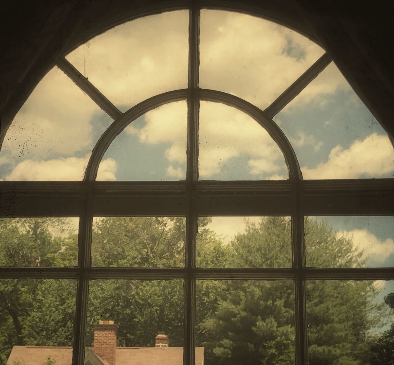 LOW ANGLE VIEW OF WINDOW IN SKY