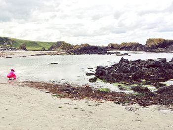 Scenic view of beach against sky