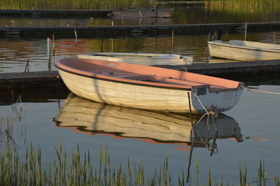 Boat moored in lake