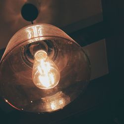Close-up of illuminated light bulb