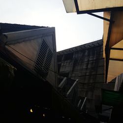 Low angle view of buildings against clear sky