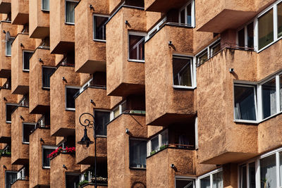 Part of modern residential apartment with flat building exterior. detail of ew brown house and home