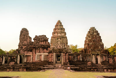 Old temple building against clear sky