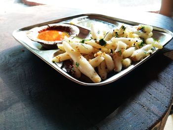 High angle view of vegetables in plate on table