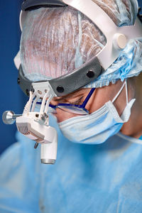 High angle view of man wearing protective mask