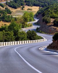 Empty winding road on meteora, greece