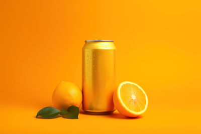 Close-up of drink against yellow background