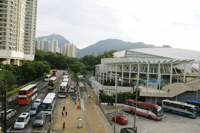 Cars on city against sky