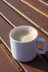 Close-up of coffee cup on table