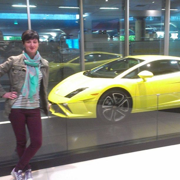 lifestyles, person, casual clothing, leisure activity, full length, transportation, standing, young adult, front view, looking at camera, portrait, reflection, young men, mode of transport, three quarter length, indoors, smiling, boys