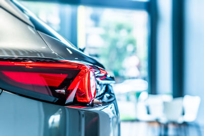 Close-up of red vintage car