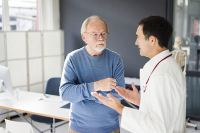 Doctor and patient talking in medical practice