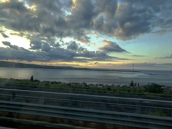 Scenic view of sea against sky at sunset