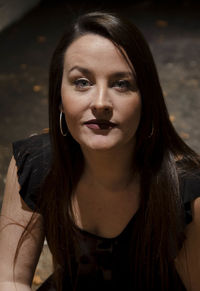 Portrait of beautiful woman sitting at home