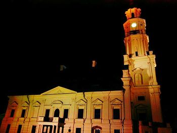 Low angle view of illuminated built structure