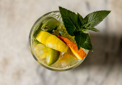 Close-up of lemon on glass table