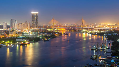 Illuminated buildings in city at night