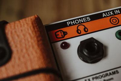 Close-up of amplifier on table