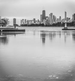 Reflection of cityscape in water