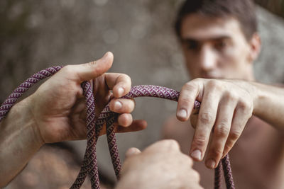 Close-up of hand holding paper