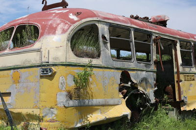 Abandoned rusty metal bus structure