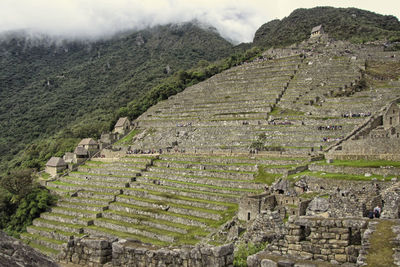 High angle view of old ruins against sky