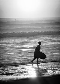 Silhouette of people on beach