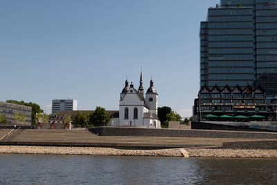 View of buildings against clear sky