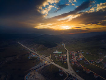 High angle view of city during sunset