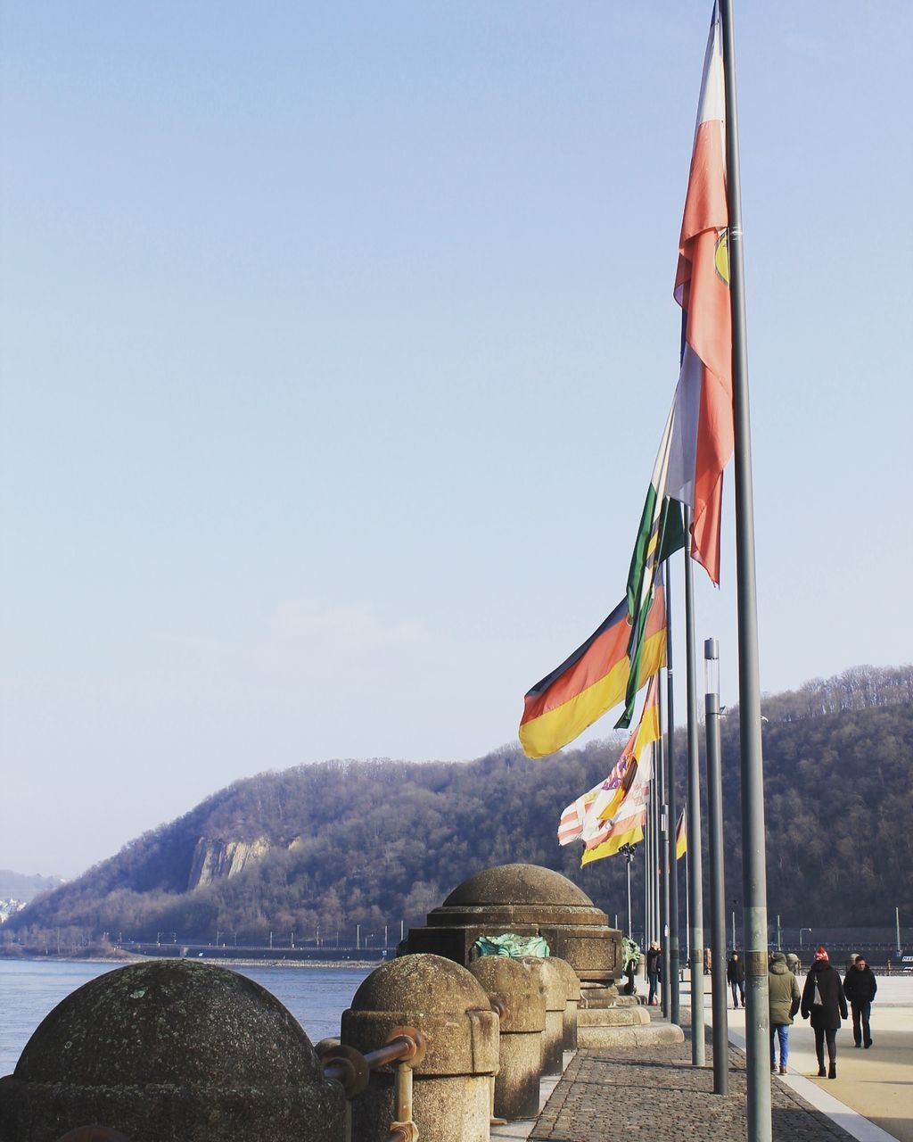 flag, sky, patriotism, outdoors, day, architecture, real people, nature, water, men, mountain